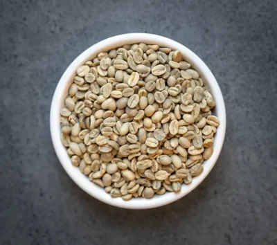 Bowl of Emperor’s Organic espresso blend green coffee beans