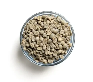 Bowl filled with raw Nicaragua Fair Trade Organic green coffee beans from Sonofresco