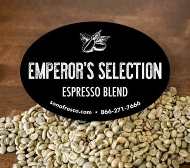 Close-up of green coffee beans from Sonofresco’s Emperor’s Selection Espresso Blend, showcasing their rich color and smooth texture.