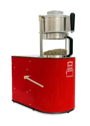 Red Sonofresco two-pound coffee roaster showcasing green coffee beans in a transparent roasting chamber