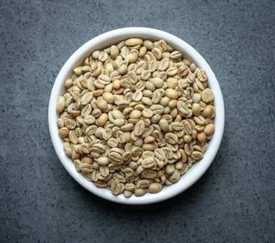 Ethiopia Sidamo natural green coffee beans in a white bowl