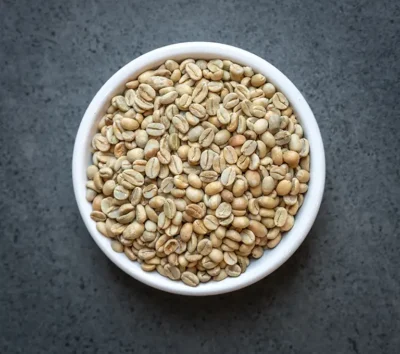 Ethiopia Sidamo Natural FTO green coffee beans in a white bowl